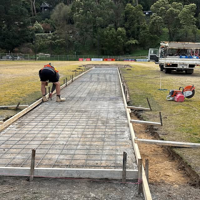 Steel reinforcing mesh laid for a concrete pathway